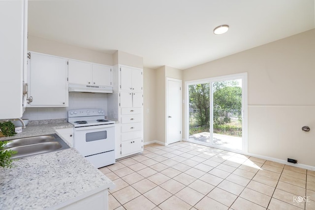 kitchen featuring light tile patterned flooring, sink, white cabinets, and electric stove