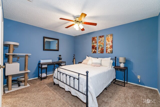 3210 Briargrove Ln, San Angelo, TX 76904 - bedroom featuring carpet floors, baseboards, and a textured ceiling