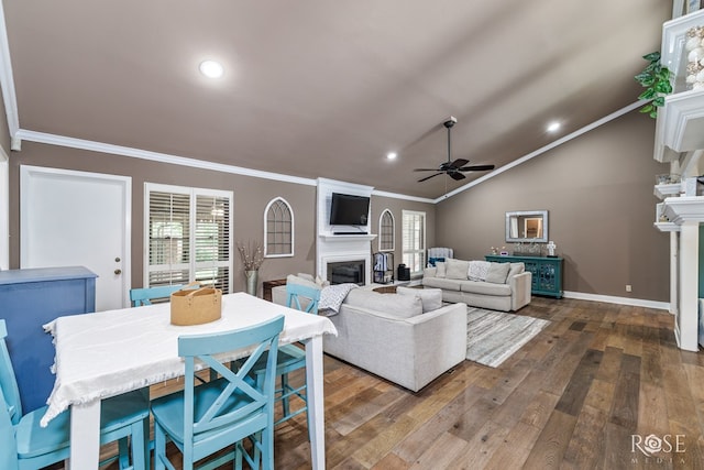 3210 Briargrove Ln, San Angelo, TX 76904 - living room featuring crown molding, dark wood-type flooring, and a fireplace