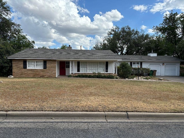 2661 Oxford Ave, San Angelo, TX 76904 - single story home featuring a garage and a front lawn