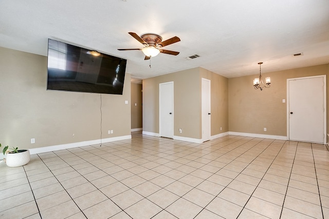 3101 Grove Dr, San Angelo, TX 76903 - unfurnished living room featuring ceiling fan, a chandelier, baseboards, and light tile patterned floors