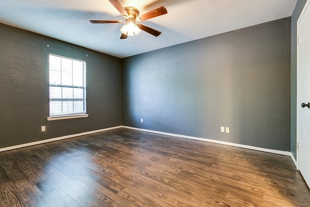 3101 Grove Dr, San Angelo, TX 76903 - unfurnished room with wood finished floors, a ceiling fan, and baseboards