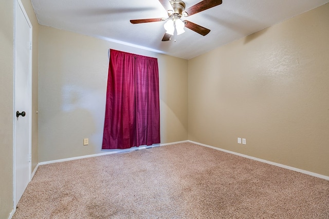 3101 Grove Dr, San Angelo, TX 76903 - carpeted empty room with a ceiling fan and baseboards