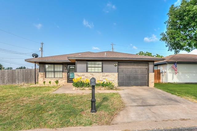 3101 Grove Dr, San Angelo, TX 76903 - ranch-style home featuring brick siding, driveway, a garage, and a shingled roof