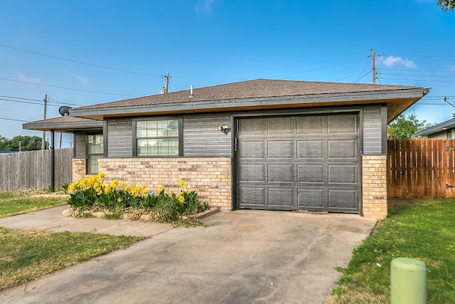 3101 Grove Dr, San Angelo, TX 76903 - view of front of property featuring concrete driveway and brick siding