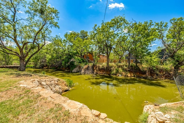 view of yard featuring a water view