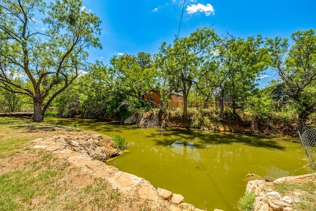 view of yard with a water view