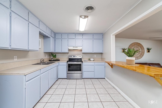 kitchen with white cabinetry, sink, light tile patterned floors, and stainless steel range with electric cooktop