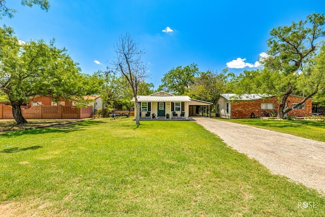 exterior space with a carport and covered porch