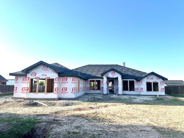 unfinished property with fence
