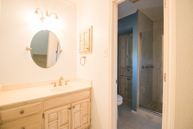 bathroom with vanity, an enclosed shower, toilet, crown molding, and tile patterned floors