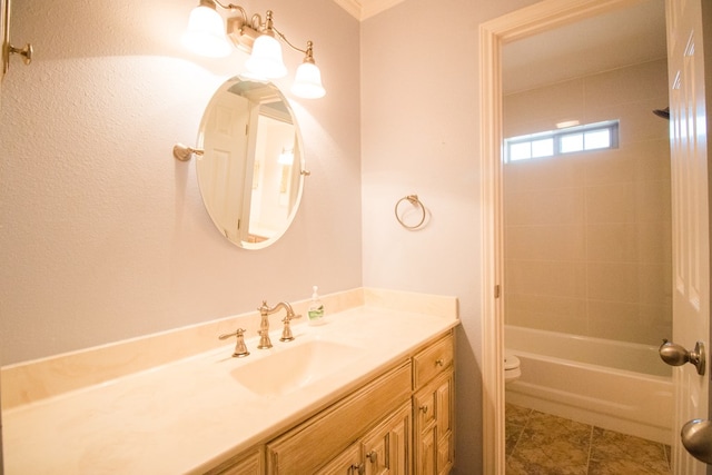 full bathroom featuring vanity, tile patterned floors, washtub / shower combination, and toilet