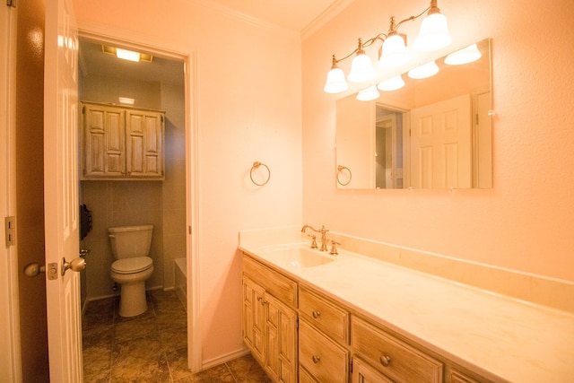 bathroom with vanity, a tub to relax in, ornamental molding, and toilet