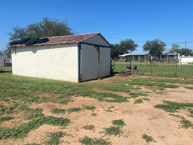 exterior space featuring a shed