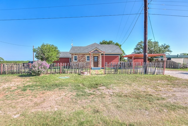 6376 Fm 380, San Angelo, TX 76905 - view of front of house with a detached carport and a shingled roof