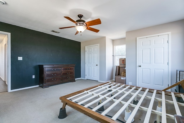 6376 Fm 380, San Angelo, TX 76905 - bedroom with baseboards, carpet flooring, and ceiling fan