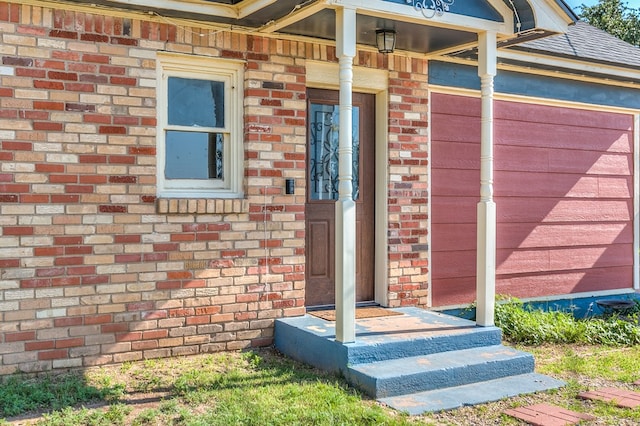 6376 Fm 380, San Angelo, TX 76905 - view of exterior entry with brick siding and an attached garage