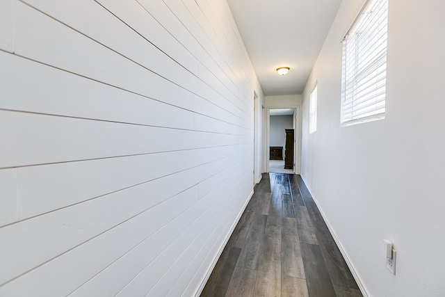 6376 Fm 380, San Angelo, TX 76905 - hallway featuring dark wood finished floors and baseboards