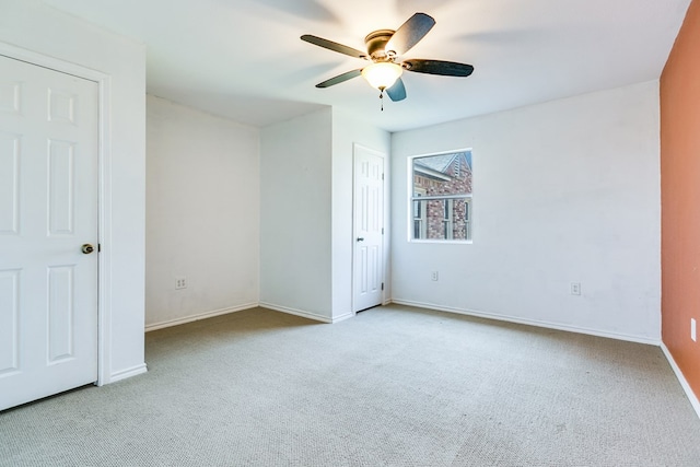 6376 Fm 380, San Angelo, TX 76905 - unfurnished bedroom featuring carpet floors, baseboards, and ceiling fan