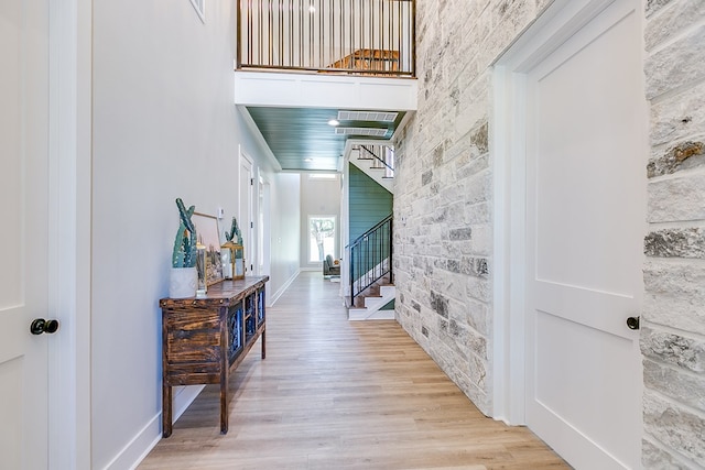 hallway featuring light wood-type flooring