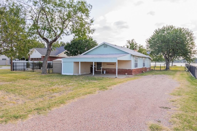 exterior space featuring a front lawn