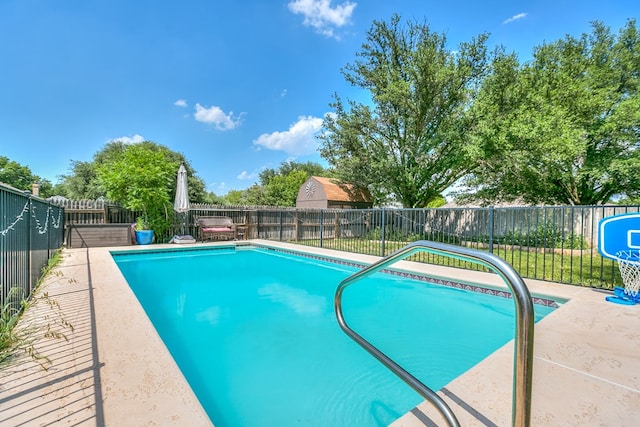 6038 Winners Cir, San Angelo, TX 76904 - view of swimming pool featuring a fenced backyard