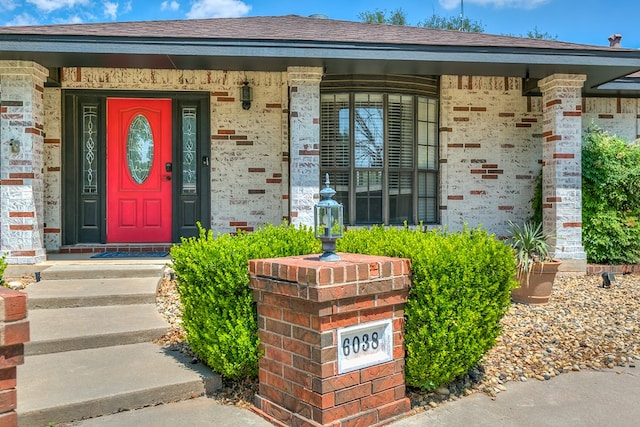 6038 Winners Cir, San Angelo, TX 76904 - entrance to property featuring a porch and brick siding