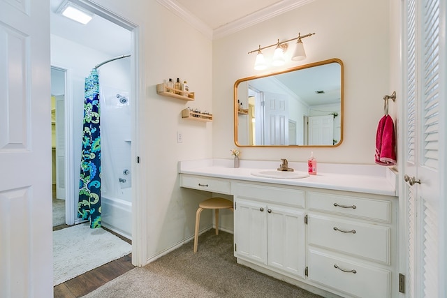 6038 Winners Cir, San Angelo, TX 76904 - full bath featuring vanity, shower / tub combo, ornamental molding, wood finished floors, and baseboards