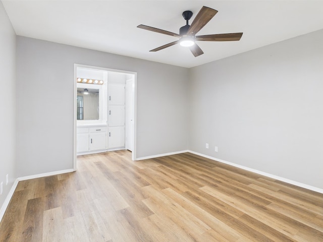 1203 Gordon Blvd, San Angelo, TX 76905 - spare room with light wood finished floors, a ceiling fan, and baseboards