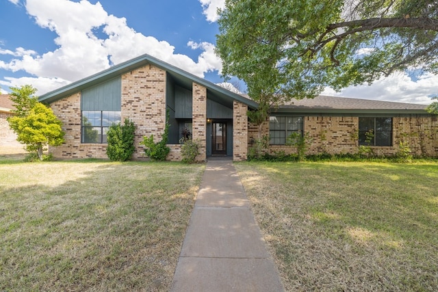 view of front of home with a front yard