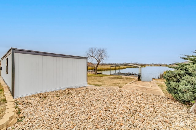 exterior space with a water view