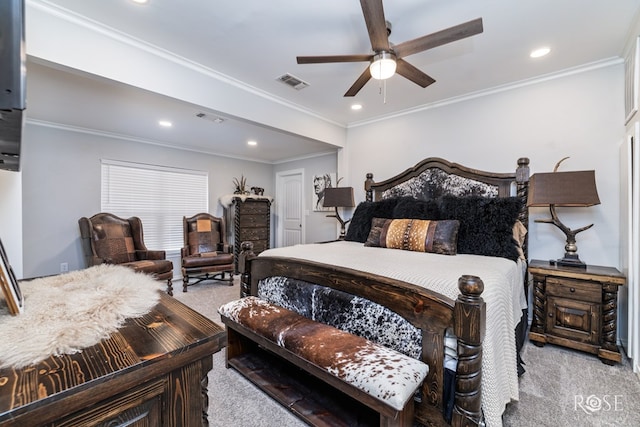 carpeted bedroom with ornamental molding and ceiling fan