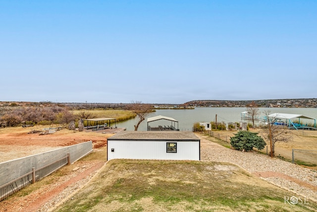 exterior space with a water view