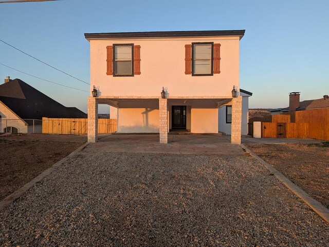 rear view of property with a patio area