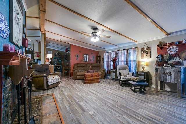 living room featuring hardwood / wood-style floors, vaulted ceiling, a textured ceiling, and ceiling fan