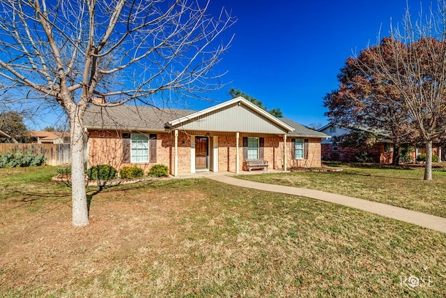 single story home featuring a front yard