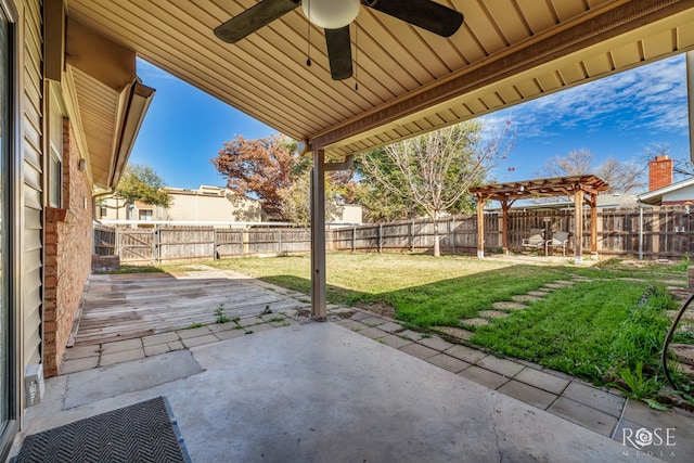 view of patio / terrace featuring ceiling fan