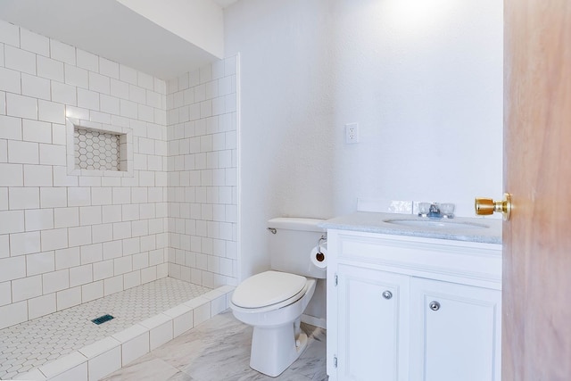 1221 Howard Ave, San Angelo, TX 76901 - full bathroom featuring vanity and tiled shower