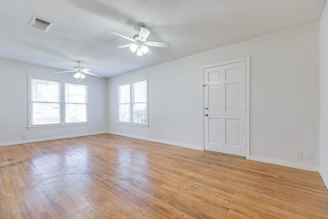 1221 Howard Ave, San Angelo, TX 76901 - empty room with light wood-style floors and ceiling fan