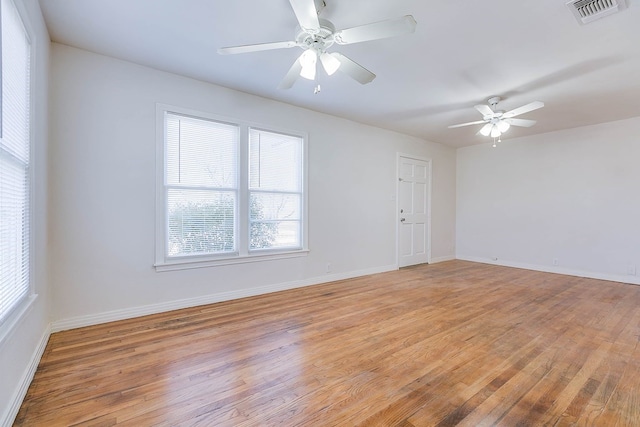 1221 Howard Ave, San Angelo, TX 76901 - spare room featuring light wood-style floors and a ceiling fan