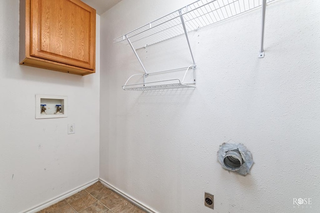 laundry room featuring cabinets, washer hookup, and electric dryer hookup