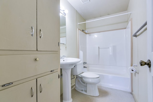 bathroom with toilet and shower / bathing tub combination