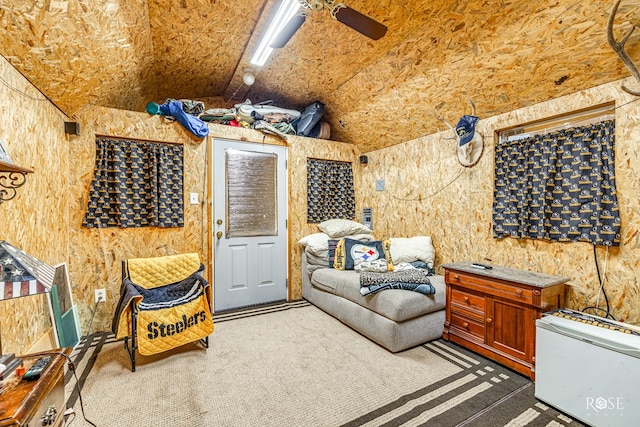 2713 Canyon Creek Dr, San Angelo, TX 76904 - sitting room featuring carpet flooring, vaulted ceiling, and a ceiling fan