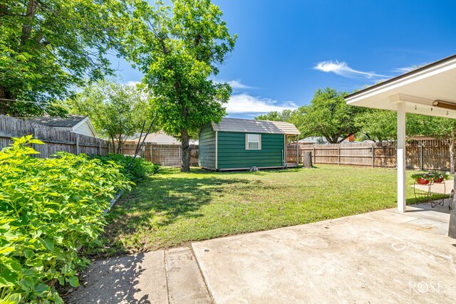 2713 Canyon Creek Dr, San Angelo, TX 76904 - view of yard with a patio, an outdoor structure, and a shed