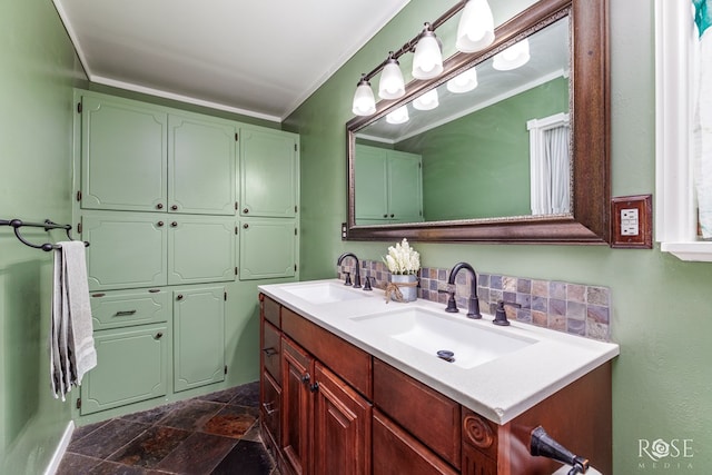 2713 Canyon Creek Dr, San Angelo, TX 76904 - full bathroom with stone finish flooring, double vanity, and ornamental molding