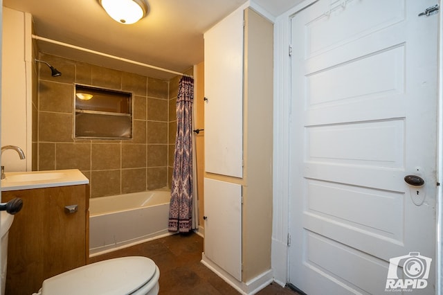 full bathroom with vanity, toilet, and shower / tub combo