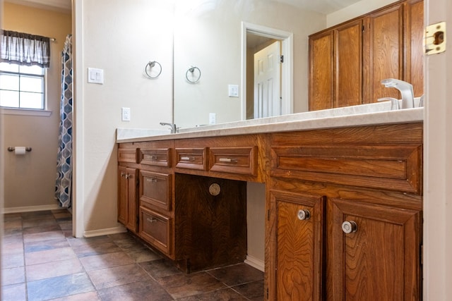 3329 Clearview Dr, San Angelo, TX 76904 - bathroom with vanity and baseboards