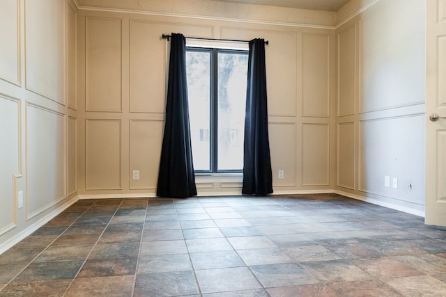 3329 Clearview Dr, San Angelo, TX 76904 - empty room with a decorative wall and stone finish floors