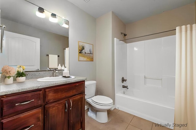 4506 Oak Grove Blvd, San Angelo, TX 76904 - bathroom featuring tile patterned flooring, shower / bathtub combination with curtain, toilet, and vanity
