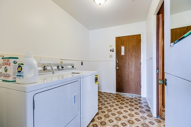 2645 A & M Ave, San Angelo, TX 76904 - clothes washing area featuring washer and clothes dryer, light floors, and baseboards